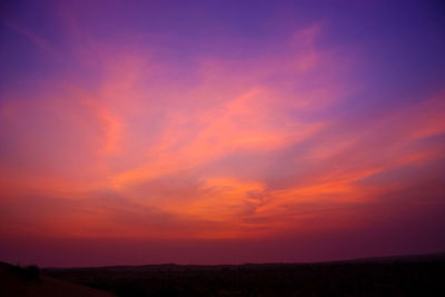 Scenic view of silhouette landscape against sky during sunset