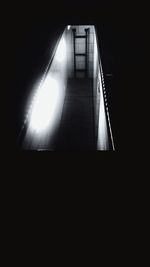 Low angle view of illuminated lights at night