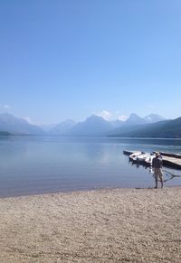 Scenic view of sea with mountains in background