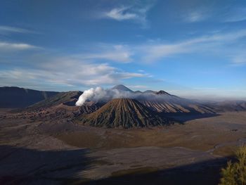 Panoramic view of volcanic landscape against sky