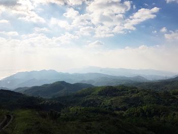 View of mountain range against cloudy sky