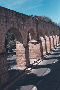 Shadow of historic building against sky