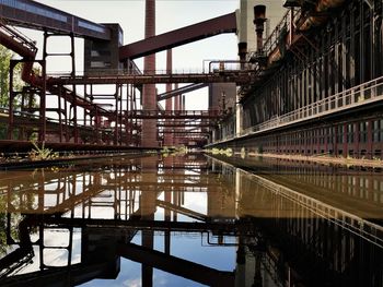 The view over the industrial buldings of the zeche zollverein, an ancient mine, with its pipelines.