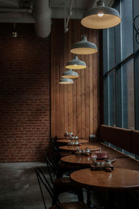 Table and chairs in illuminated room