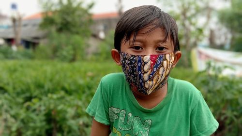 Kid wear batik mask