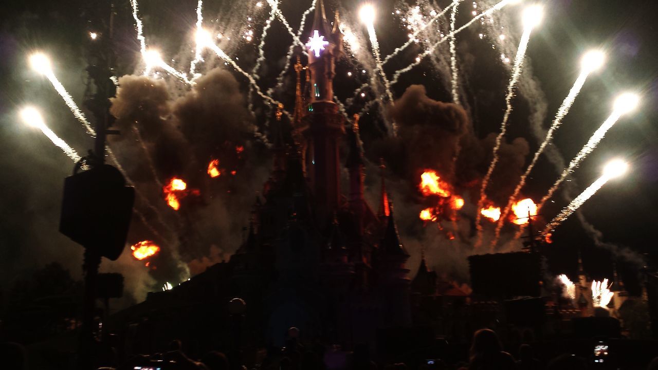 LOW ANGLE VIEW OF FIREWORKS DISPLAY