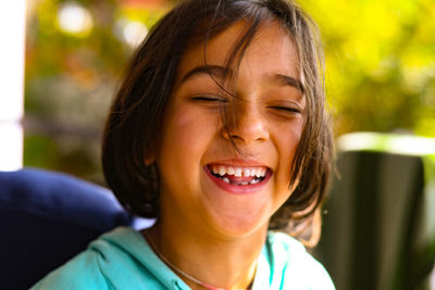 Close-up portrait of a smiling girl