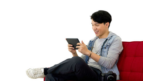 Young man using mobile phone