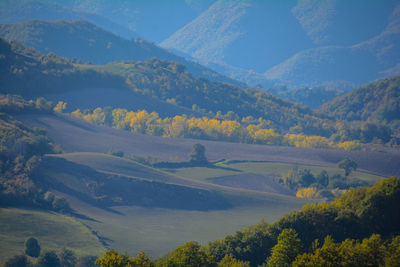 High angle view of trees and mountains against sky