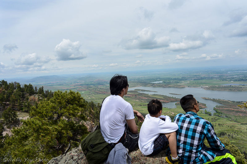 leisure activity, lifestyles, sky, togetherness, rear view, casual clothing, bonding, cloud - sky, men, love, person, sitting, nature, beauty in nature, scenics, boys, vacations, family