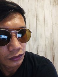 Portrait of young man wearing sunglasses