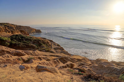 Scenic view of sea against sky during sunset