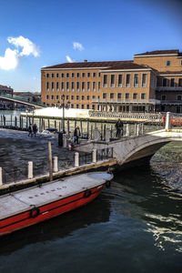 View of canal along buildings