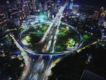 High angle view of light trails on road in city