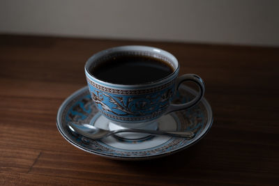 Close-up of coffee cup on table