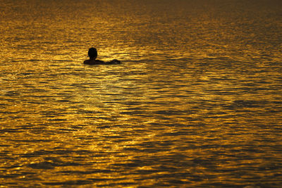 Scenic view of sea at sunset