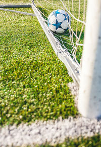 High angle view of soccer ball on field