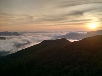 Scenic view of mountains against sky during sunset