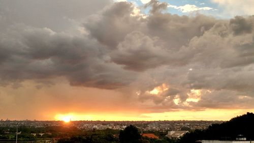 Scenic view of landscape against cloudy sky