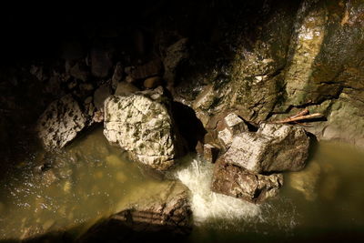 Close-up of rock formation in water