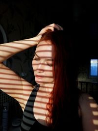 Woman with long hair at home