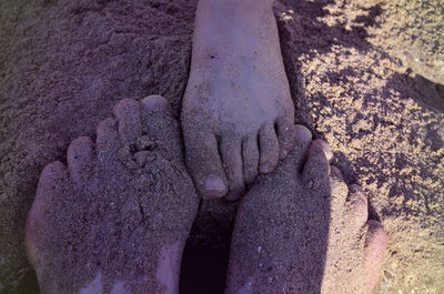 Close-up of statue on sand