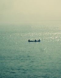 Boat sailing in sea