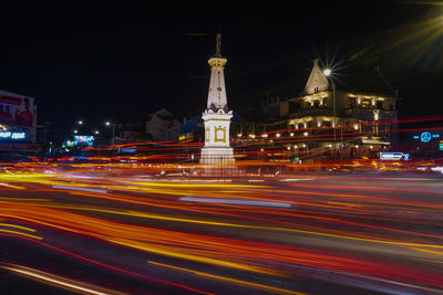 High angle view of light trails on road at night