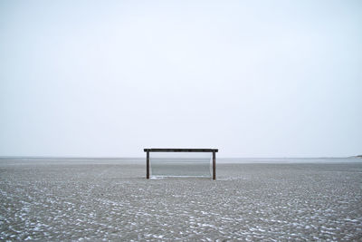 Scenic view of soccer goal on beach