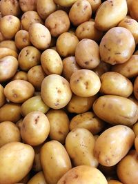 Full frame shot of onions for sale at market stall