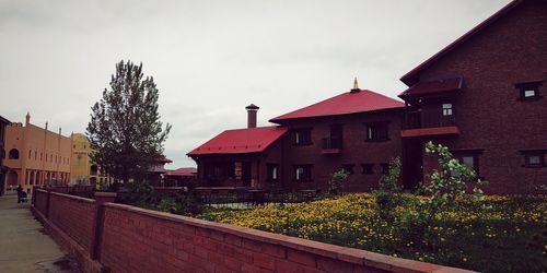 Houses and buildings against sky