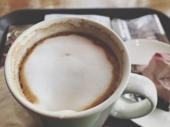 Close-up of cappuccino on table