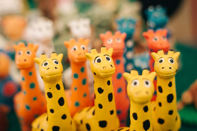 Close-up of giraffe toys for sale at shop
