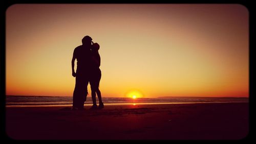 Scenic view of sea at sunset