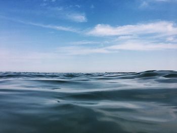 Surface level of sea against sky