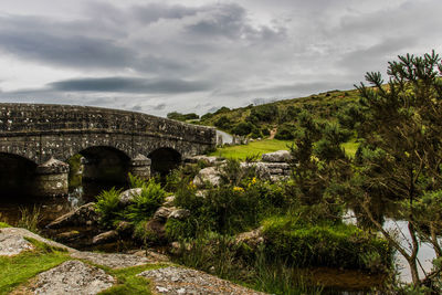 Arch bridge against sky