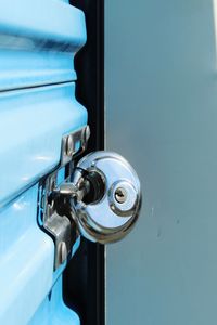 Close-up of pad lock on storage door