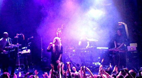 Panoramic view of crowd at music concert