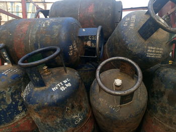 Close-up of abandoned cylinders