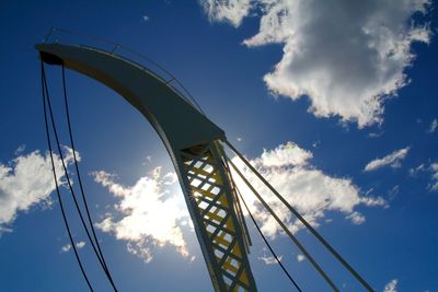 Low angle view of rollercoaster against sky