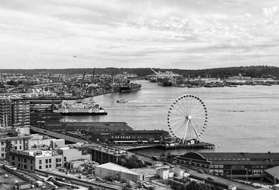 High angle view of ferris wheel in city