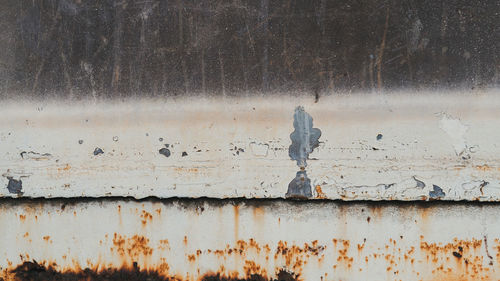 Rusty metal on wall