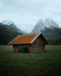 House on field against sky