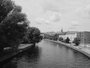 View of canal along buildings