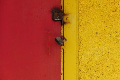 Close-up of locked red door