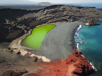 High angle view of rock formation in sea