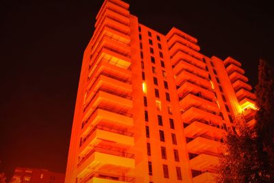 Low angle view of buildings at night