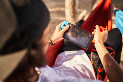 High angle view of man using mobile phone