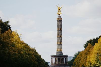 Low angle view of statue against sky