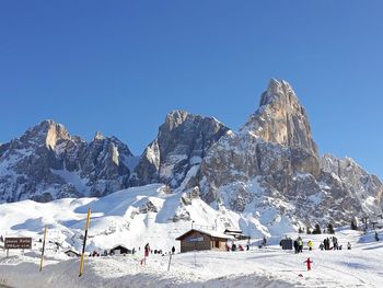 Panoramic view of snowcapped mountains against clear sky